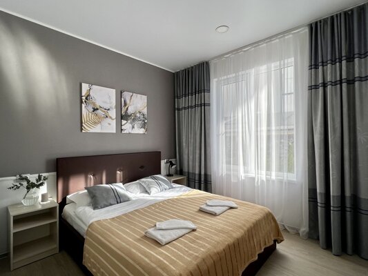 Апартаменты Deluxe 4-местный 2-комнатный (с кухней)